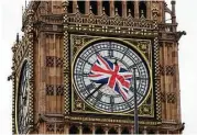  ?? Matt Dunham / Associated Press ?? The Union Jack flies in front of Big Ben, which has marked British history since 1859 and will witness more as the country faces uncertaint­y.