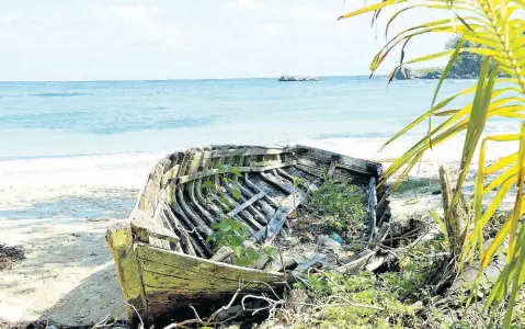  ?? FILE ?? In this file photo, an abandoned boat is seen at Winnifred Beach, Portland. It is claimed that belonged to a group of Haitians.