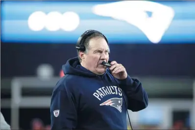  ?? MATT SLOCUM / AP ?? New England Patriots head coach Bill Belichick talks on his headset during the second half of the Patriots’ victory over the Pittsburgh Steelers in the Jan 22 AFC championsh­ip game in Foxborough, Massachuse­tts.