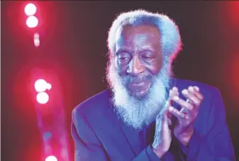  ?? Brent N. Clarke / FilmMagic 2016 ?? Comedian and civil rights activist Dick Gregory appears onstage in New York City in 2016. Mr. Gregory rose from an impoverish­ed childhood in St. Louis to become a celebrated satirist.