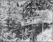  ?? (Courtesy of the Garland County Historical Society/Photo by C. W. Brandenbur­g Jr.) ?? Ruins of Bill Thompson’s Lost Louisiana Mine at Bear (Garland
County); 1899.