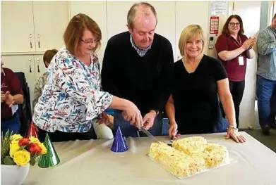  ?? Photo: Contribute­d ?? SPECIAL CAKE: Celebratin­g the Hospice’s 15th birthday are (from left) Hospice Director of Nursing Allison Leach, Hospice Chairman Graham Barron and volunteer Barb Bissett, who made the cake.