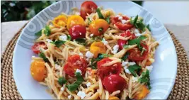  ?? PHOTOS BY YAKIR LEVY ?? Hearts of palm pasta and baby tomatoes are flavored with feta cheese and fresh mint.