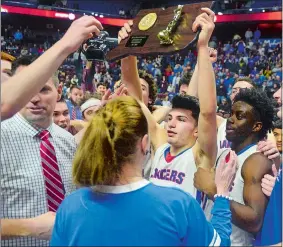  ?? SARAH GORDON/THE DAY ?? Mikey Buscetto, who had 27 points and 10 assists in leading Waterford to a Division III state championsh­ip at Mohegan Sun Arena, graduates as the Lancers’ all-time leading scorer with 1,459 points. He also set the career assists record witih 861.