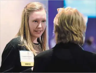  ?? BARRY GRAY THE HAMILTON SPECTATOR ?? Chelsea Mackinnon received the Young Woman of Distinctio­n award during Thursday evening’s gala at the Hamilton Convention Centre.