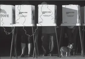  ?? GENARO MOLINA/LOS ANGELES TIMES ?? Key world events could spur greater voter participat­ion in November, according to a voter survey by UC San Diego.