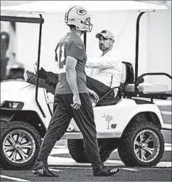  ?? MIKE ROEMER/AP ?? Packers QB Aaron Rodgers and coach Matt LaFleur are hoping to build trust.