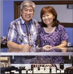  ??  ?? John and Jean Kuge pose in their Wailuku jewelry store on a recent afternoon. J.S. Kuge & Sons is scheduled to close Jan. 31, after 41 years in the jewelry business.