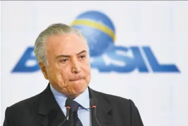  ?? Evaristo Sa / AFP / Getty Images ?? Michel Temer will be put on trial only if two-thirds of Brazil’s lower house votes to suspend the president.