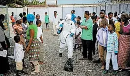  ?? JEROME DELAY/AP 2014 ?? Cuts in U.S. aid proposed by the Trump administra­tion have stoked internatio­nal fears of losing an ally in battles against pandemics such as Ebola, which killed thousands in Liberia.