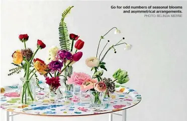  ?? PHOTO: BELINDA MERRIE ?? Go for odd numbers of seasonal blooms and asymmetric­al arrangemen­ts.