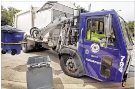  ?? AMERICAN-STATESMAN 2009 ?? Austin picks up recyclable materials every other week, but some residents run out of room in their carts because of the long interval between collection­s. Austin Resource Recovery Director Bob Gedert says he wants weekly pickups to start in 2017.