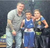  ??  ?? ●●Hamer boxer Charlie Braddock, right, with Bode Hall and Rickie Hatton