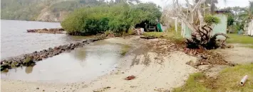  ??  ?? Sea water seeps into the already establishe­d seawall during high tide at Narikoso, Ono, Kadavu.