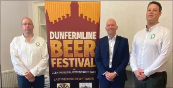  ?? ?? IT’S getting closer. Craig Smith, of Beer Festival organisers Dunfermlin­e Round Table, with Forth Tech duo Tom Davison, left, and Gary Campbell