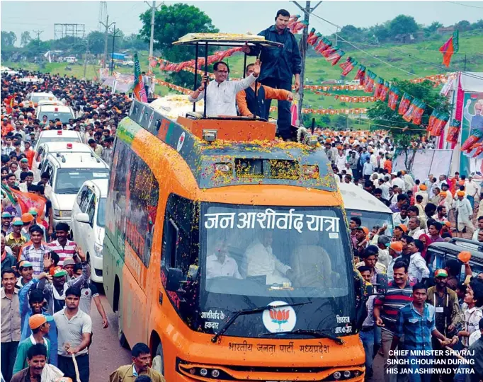  ??  ?? MUSTAFAHUS­SAIN CHIEF MINISTER SHIVRAJ SINGH CHOUHAN DURING HIS JAN ASHIRWAD YATRA