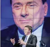  ?? LaPresse ?? Nazareni L’ex premier Renzi ospite di Porta a Porta, con l’immagine di Berlusconi sullo sfondo