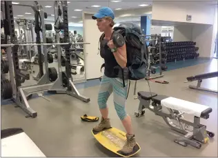  ?? Christina Cox/The Signal ?? WiSH Education Foundation Executive Director Amy Daniels trains for her climb to the summit of Gokyo Ri in Nepal at Henry Mayo Newhall Fitness and Health on Friday.