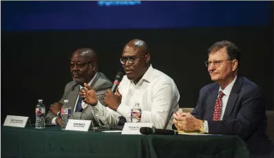  ?? Arkansas Democrat-Gazette/JEFF GAMMONS ?? Flanked Saturday by Police Chief Keith Humphrey (left) and City Attorney Tom Carpenter, Little Rock Mayor Frank Scott Jr. answers an audience-member’s question during Saturday’s open forum held for the Hispanic community in Little Rock.