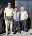  ??  ?? Bill Shugarts, left, Dao Minh Xuyen (former Viet Cong soldier) and Retired U. S. Army Command Sergeant Major Frank meet at the Vietnam Veterans Memorial in Washington, D.C.