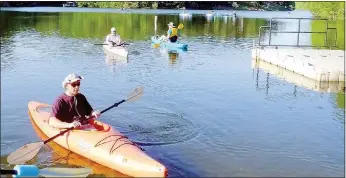  ?? Lynn Atkins/The Weekly Vista Lynn Atkins/ The Weekly Vista ?? George Griffiths waits near the boat launch on Lake Norwood as kayakers gather for their weekly paddle.