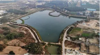  ?? — AFP photos ?? An aerial view of the restored Bingipura lake in Bengaluru.