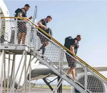  ?? Photo: Crusaders ?? . Crusaders players get off the plane at Auckland Internatio­nal Airport to catch their connecting flight to Melbourne on March 2, 2023.