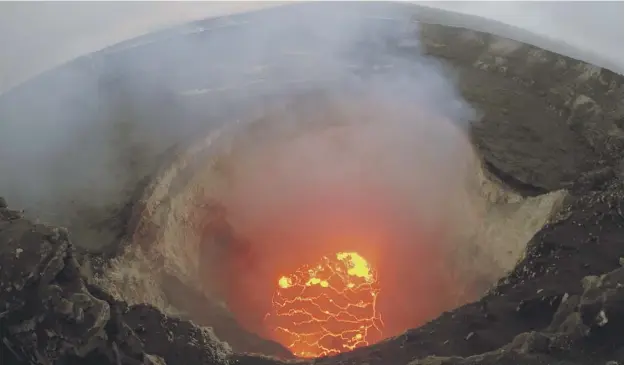  ?? PICTURE; GETTY IMAGES ?? 0 Lava in the crater of Kilauea volcano which is sending molten rock, toxic gas and steam bursting out through openings in the ground