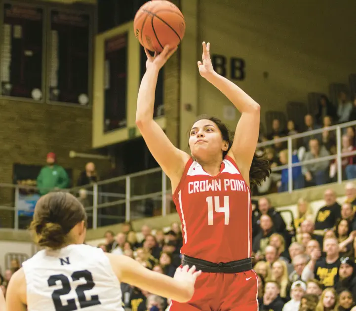  ?? VINCENT D. JOHNSON/POST-TRIBUNE ?? Crown Point’s Jessica Carrothers takes a shot against Noblesvill­e during the Class 4A Logansport Semistate on Feb. 19.