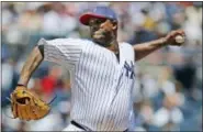  ?? KATHY WILLENS - THE ASSOCIATED PRESS ?? New York Yankees starting pitcher CC Sabathia delivers during the first inning against the Toronto Blue Jays at Yankee Stadium in New York Tuesday. Sabathia struggled in his return from the disabled list as the Blue Jays beat the Yankees.