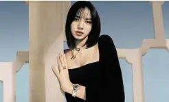  ??  ?? Lisa wearing Bulgari jewelry