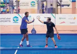  ??  ?? ↑
Sheikh Saeed Bin Maktoum Bin Juma Al Maktoum (right) celebrates with his partner Abdulrazak Ahmed after winning the match against Butii Al Suwaidi and Mohammed Al Shamsi.