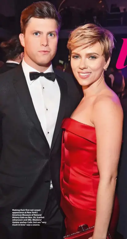  ??  ?? Making their first red-carpet appearance at New York’s American Museum of Natural History Gala on Nov. 30, Scarlett Johansson and SNL: Weekend Update anchor Colin Jost are “very much in love,” says a source.