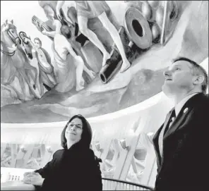  ?? Arkansas Democrat-Gazette/FRANK E. LOCKWOOD ?? U.S. Rep. Bruce Westerman and Hot Springs National Park Superinten­dent Josie Fernandez admire the artwork around the U.S. Capitol dome.