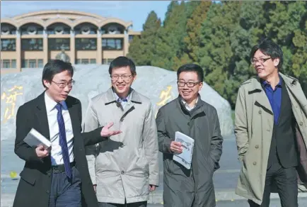  ?? ZOU HONG / CHINA DAILY ?? From left: Yue Liang, Chen Qiqing, Wang Xuebin and Li Shaowen at the campus of the Party School in Beijing on Friday.