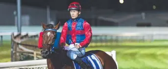  ?? Picture: Kevin Farmer ?? FIRST UP WIN: Noriyuki Masuda returns to the winners stall after taking victory in the Vale Pat Booshand QTIS 2-year-old Handicap with Jabalic.