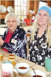  ??  ?? Above Busy making tea and coffee in the kitchen are Shirley Taylor (left) of Morwell and Janet Chandler of Jindivick at the farewell to Village Music Lovers.