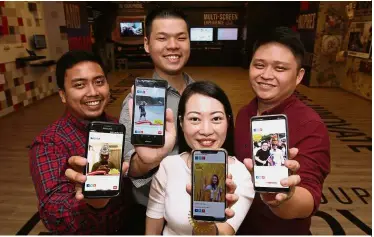  ??  ?? Patriotic posts: (From left) Nash, Yee, Lim and Gan showing their #MYpledge promises towards building a greater Malaysia.