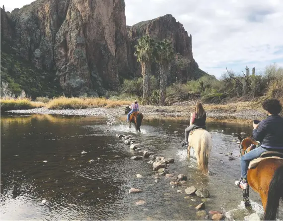  ?? PHOTOS: MICHELE JARVIE ?? Horseback riding at Saguaro Lake Guest Ranch is a great way to see Arizona’s stunning landscapes without having to do the walking yourself.