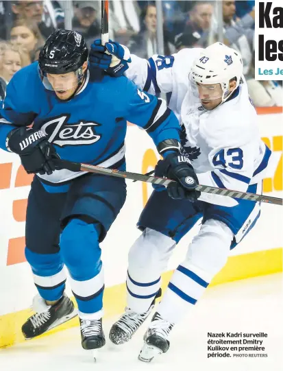  ?? PHOTO REUTERS ?? Nazek Kadri surveille étroitemen­t Dmitry Kulikov en première période.