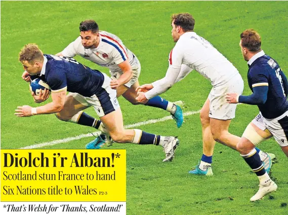  ??  ?? Scotland’s Duhan van der Merwe scores deep into injury-time to seal a 27-23 win over France – their first victory in Paris in 22 years and one which secured the Six Nations title for Wales