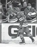  ?? JESSIE ALCHEH/AP ?? Rangers center Ryan Strome, bottom, is congratula­ted for his goal against the Jets during the second period Tuesday in New York.