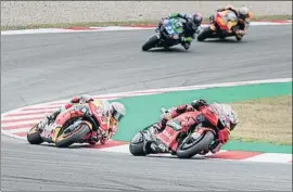  ?? XAVI JURIO ?? Márquez segueix la roda de la Ducati de Miller en la Q1