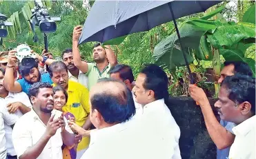  ??  ?? DMK president MK Stalin taking consoling the kin of rain victims in Cuddalore on Monday.