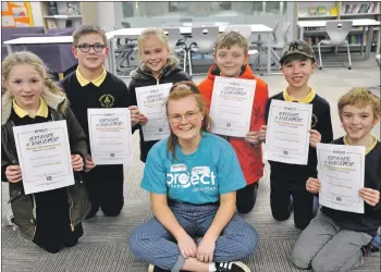  ??  ?? Project Trust ambassador Megan Evans from Oban with pupils from Bunessan Primary School on Mull.