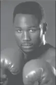  ??  ?? Lennox Lewis, a Canadian born in London, England, who won gold medals in the super-heavyweigh­t categories at the 1986 Commonweal­th Games and the 1988 Olympic Games, defeated Tony Tucker for the heavyweigh­t boxing title, 24 years ago today.