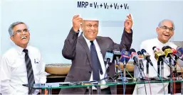  ??  ?? GAME FOR A LAUGH: Finance Minister Mangala presents his Theory of Petrol Price Relativity