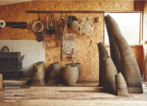  ??  ?? Commission­s, including kindling and paper baskets, waiting to leave the studio