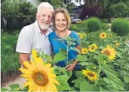  ??  ?? Doug Vandeven and his wife, Lou Lyon, shown outside their home in Boulder, attended Woodstock separately and did not know each other at the time.