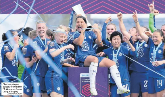  ?? JOHN WALTON/PA ?? Chelsea players celebrate with the FA Women’s Super League trophy